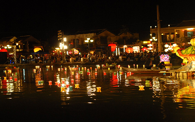 Releasing lantern on the river in Lantern Festival
