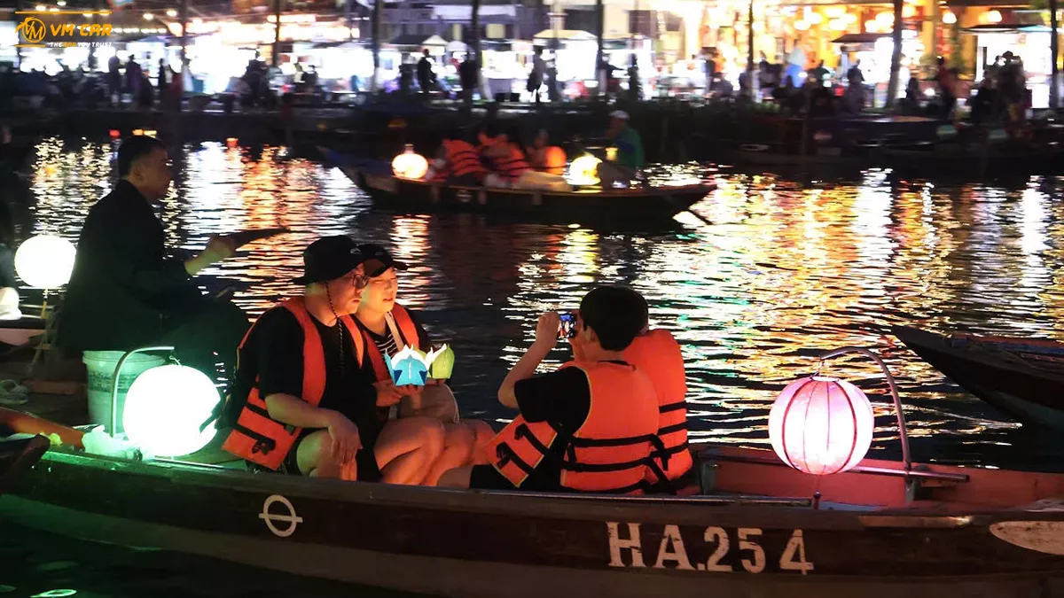 Enjoy a lantern boat ride on the Hoai River